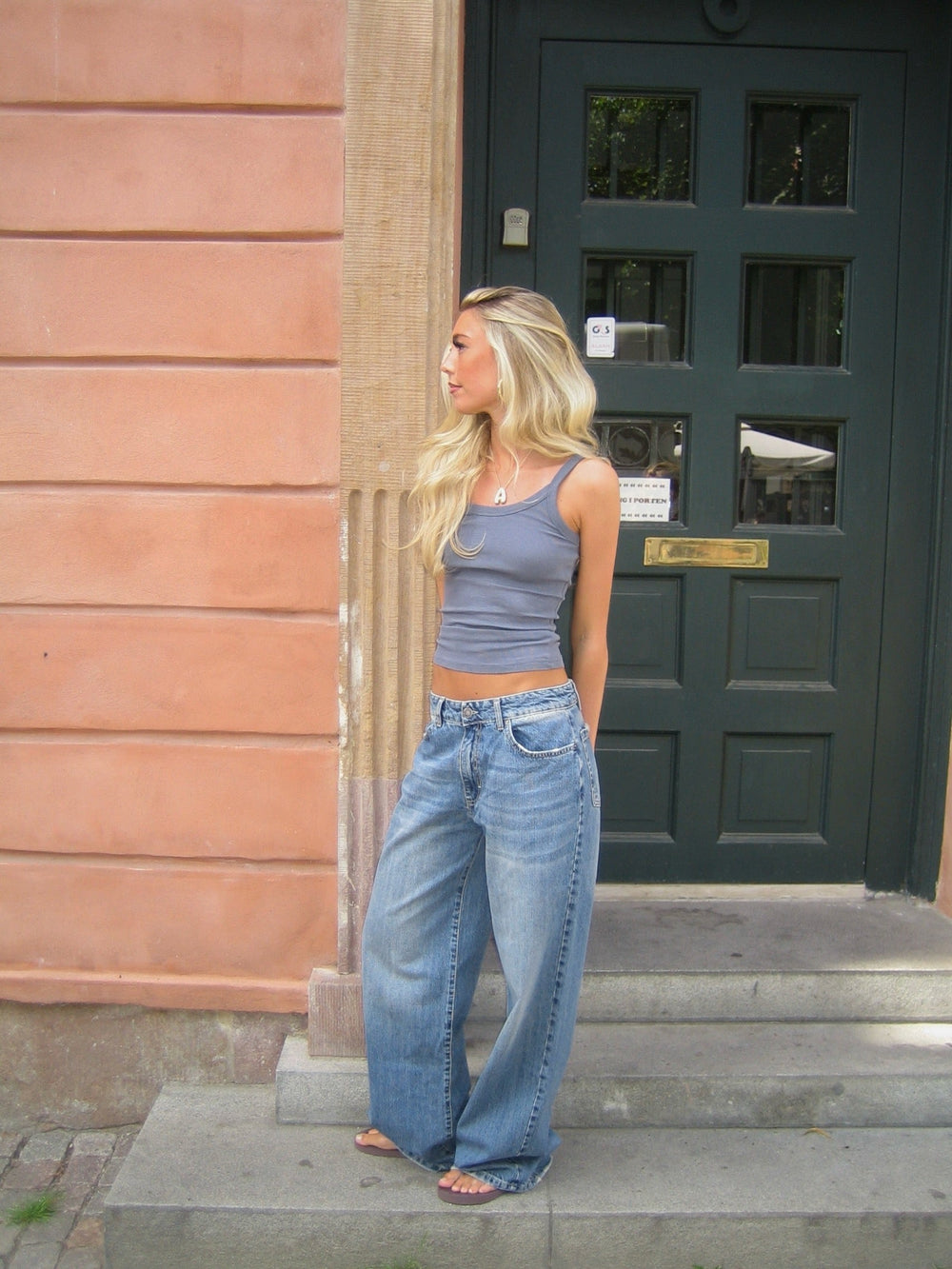 Alaia low-waisted jeans with lightning detail - Light denim