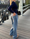 Alaia low-waisted jeans with lightning detail - Light denim