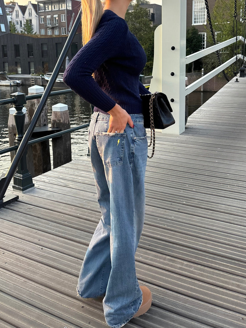 Alaia low-waisted jeans with lightning detail - Light denim