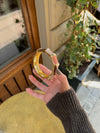 Ebony striped bangle – Coral/brown/gold/off-white
