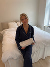 Honey Dyson sleeve - White with blue, green, and orange flowers