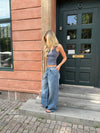 Alaia low-waisted jeans with lightning detail - Light denim