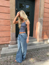 Alaia low-waisted jeans with lightning detail - Light denim