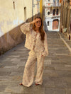 Mireille trousers with sun pattern – Beige/red