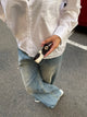 Vela cowhide keyring – White/dark brown/black