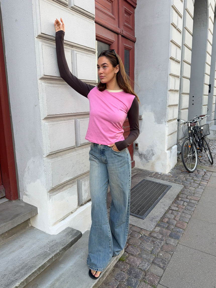 Alaia low-waisted jeans with lightning detail - Light denim