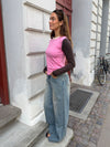 Alaia low-rise jeans with lightning detail - Light denim