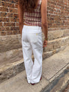 Alaia low-waisted jeans with lightning detail - White denim